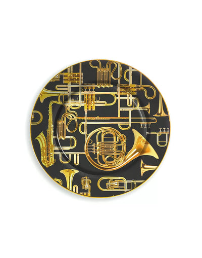 Seletti porte Toiletpaper - assiette en porcelaine bordure or Trompettes