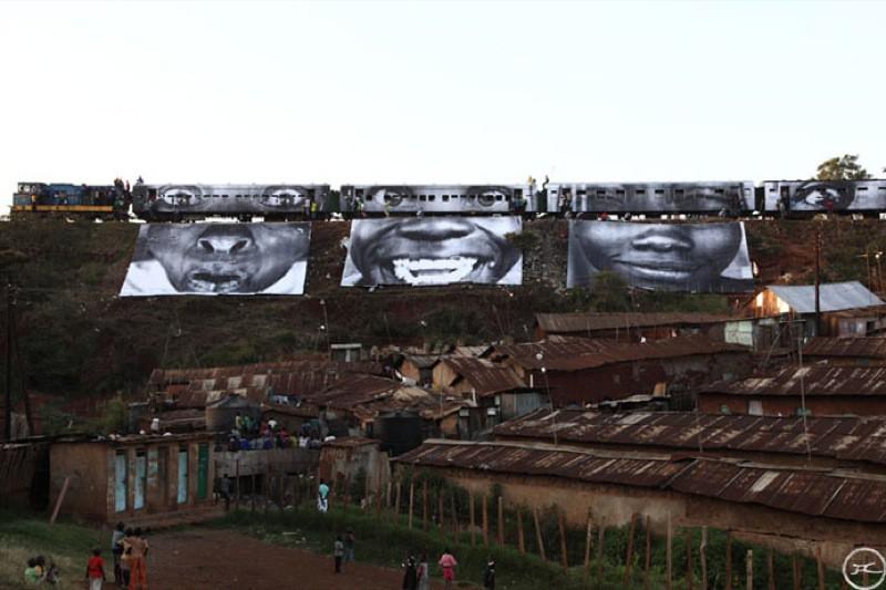 JR - "28 Millimetres, Women Are Heroes - In Kibera Slum, train passage 1"